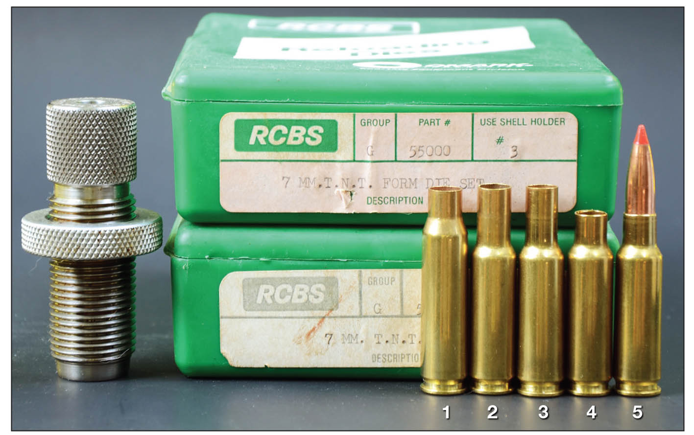 Case forming and reloading dies were included with the custom XP-100 7mm TNT. John Towle recommended forming cases from Remington .308 BR brass pocketed for small rifle primers, which is no longer available. Cases can be formed from  Starline .308 Match cases with small rifle primer pockets, but due to a thicker wall, capacity will be a bit less. These cases include a (1) Starline .308 Match case, (2) shoulder pushed back with form die No. 1, (3) the neck diameter reduced for 7mm bullets with trim die, (4) case neck trimmed and full-length resized and a (5) loaded round.